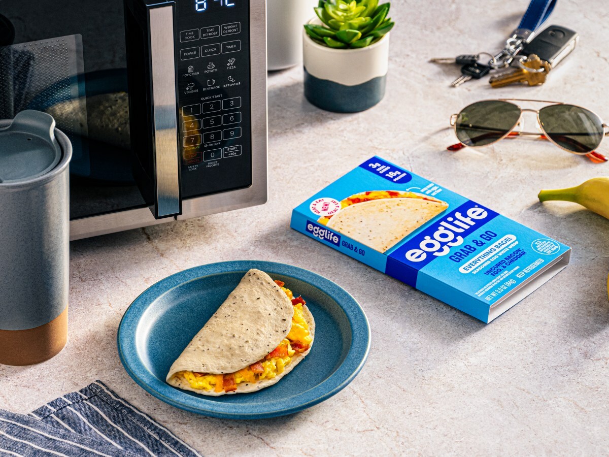 egglife box with breakfast taco on a plate