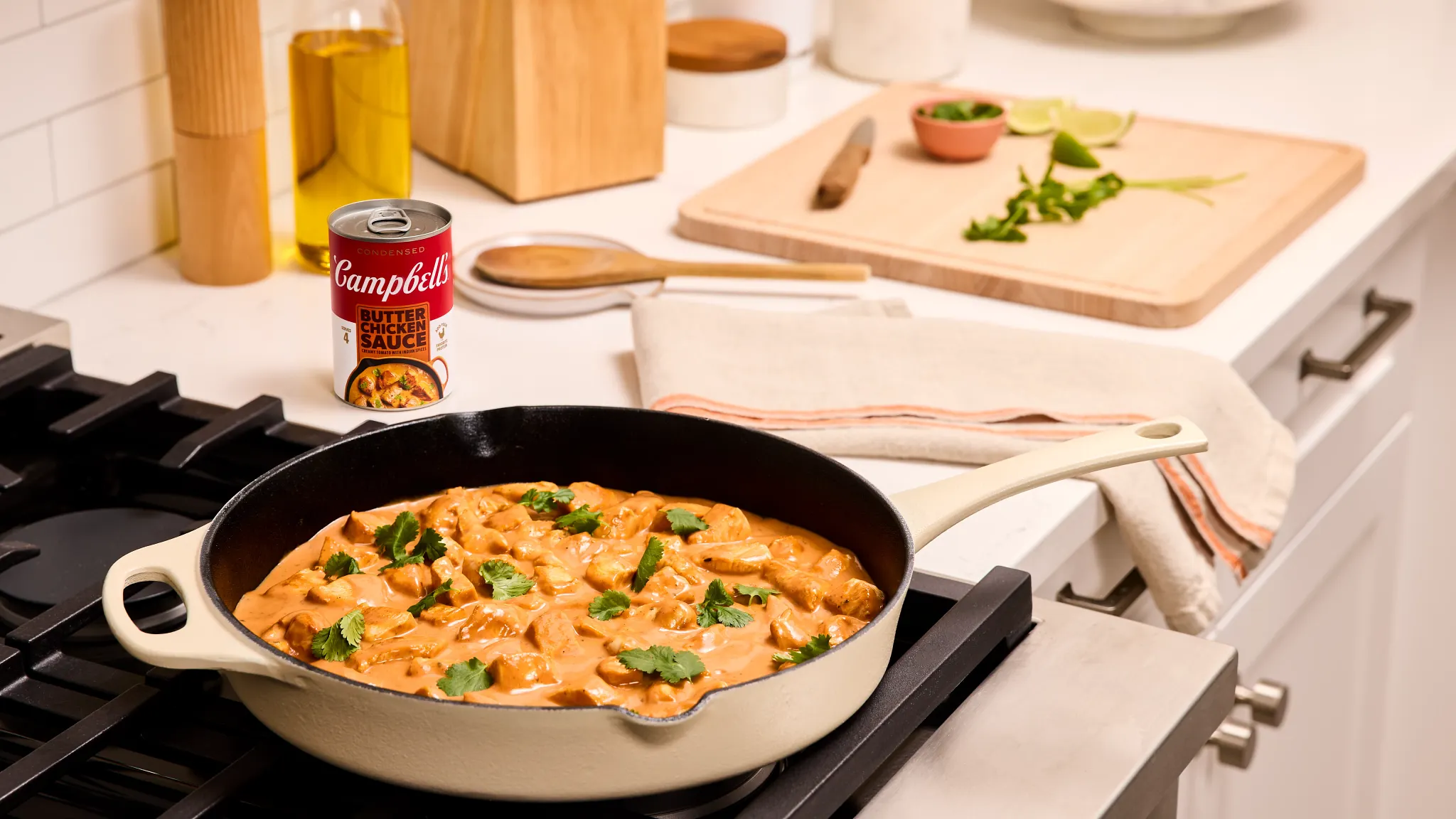 Campbell's butter chicken dinner in a pan on the stove