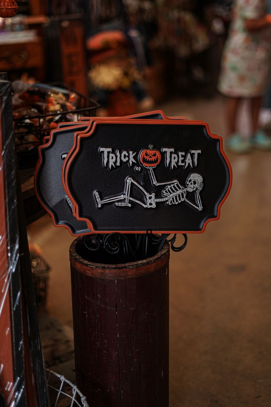 halloween trick or treat sign with skeleton